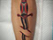 traditional dagger tattoo black red tattooed men color ink colour